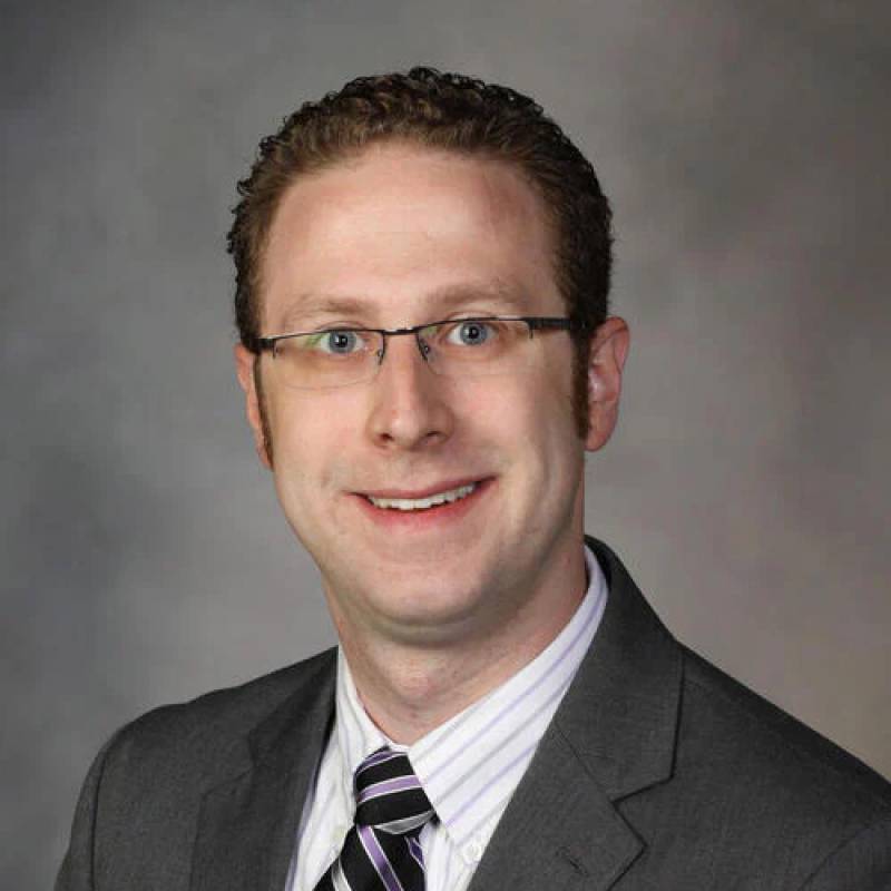 Dr. Mathew Koster